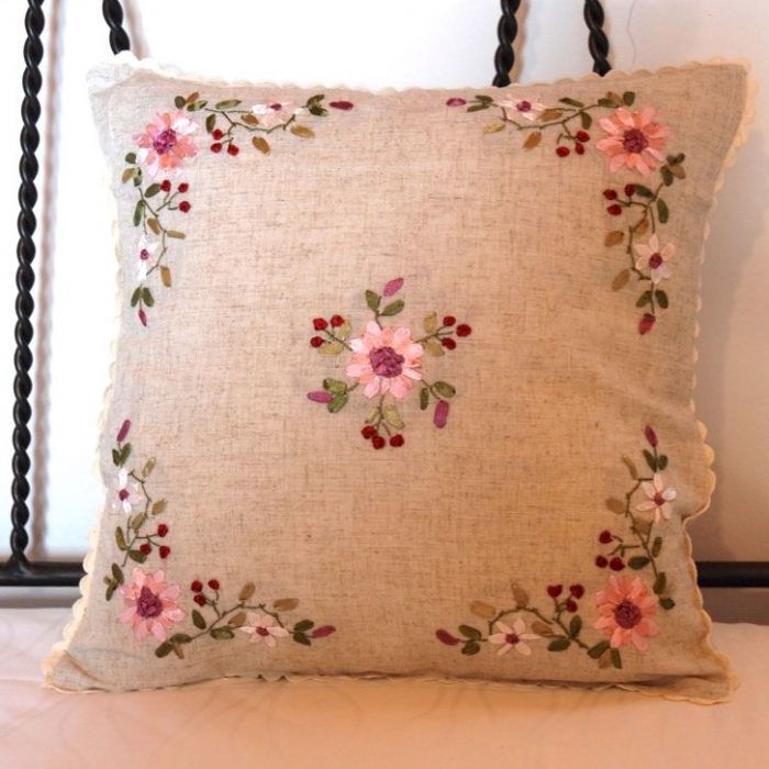 Decorative cushion embroidered with traditional greek floral design