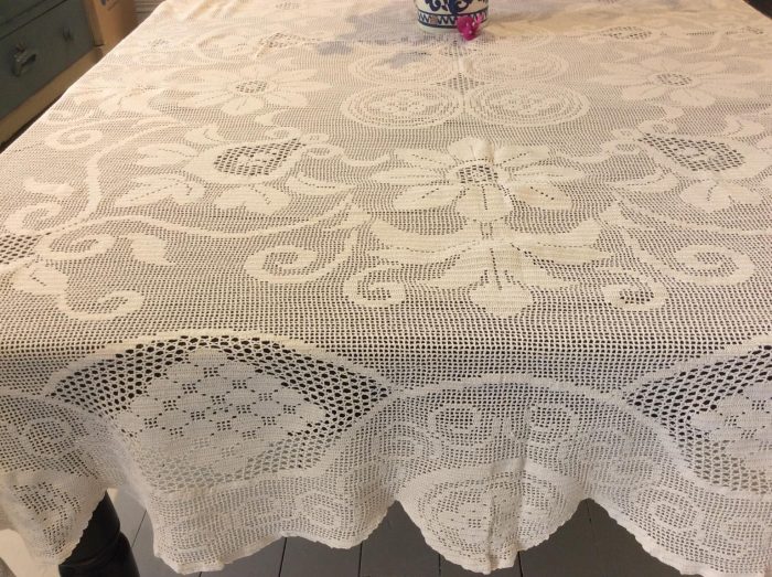 Handmade knitted tablecloth with crochet in beige color and mercerized threads